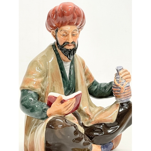 26 - A Royal Doulton ‘Omar Khayyam’ pottery figurine. 13x16cm