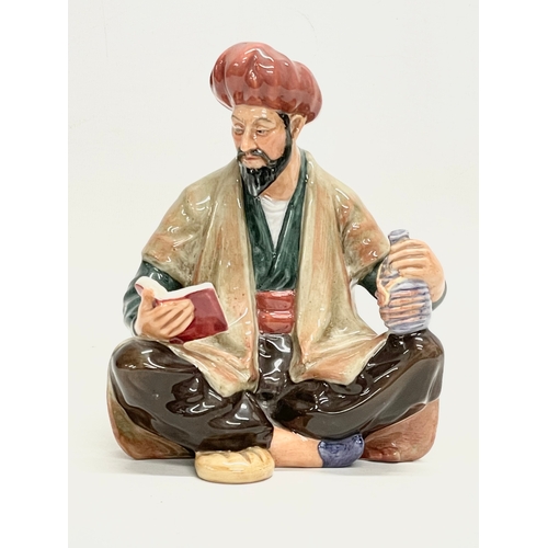 26 - A Royal Doulton ‘Omar Khayyam’ pottery figurine. 13x16cm