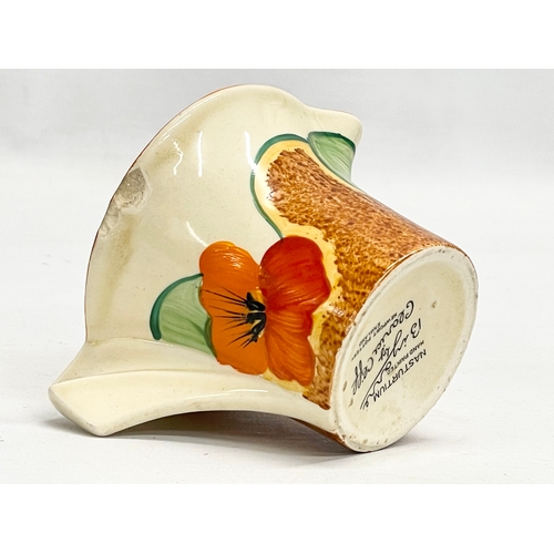 28 - A 1920’s Clarice Cliff Bizarre Nasturtium milk jug. Art Deco. 11x8x6cm.