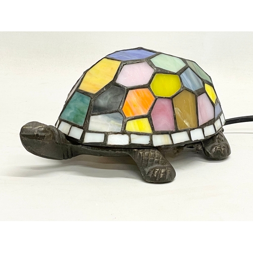 131 - A Tiffany style lamp. 14x20x10cm