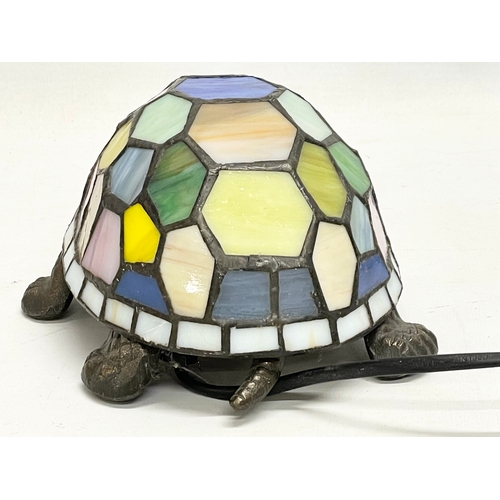 131 - A Tiffany style lamp. 14x20x10cm