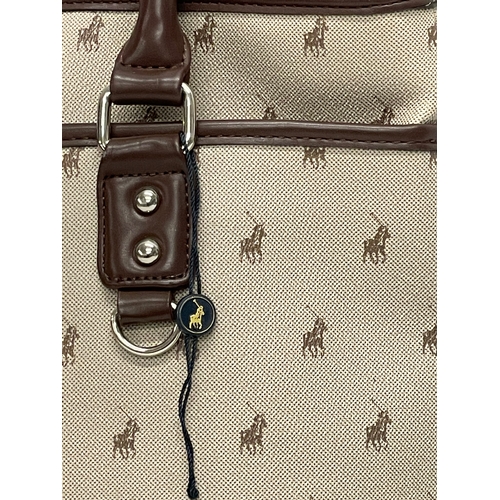 521 - A Ralph Lauren Polo handbag. 37cm