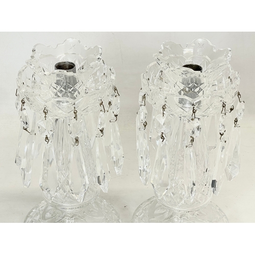 41 - A pair of vintage Waterford Crystal lustre candleholders with droplets. 25cm