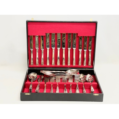 151 - A large canteen of cutlery. 38x27x7cm