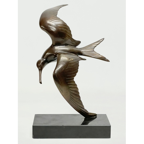 148 - A bronze seagull on slate base. 17x28.5cm.