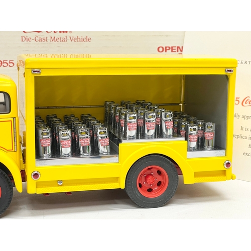 201 - A Danbury Mint 1955 Coca Cola Delivery Truck in box. Truck measures 24x11cm. Box measures