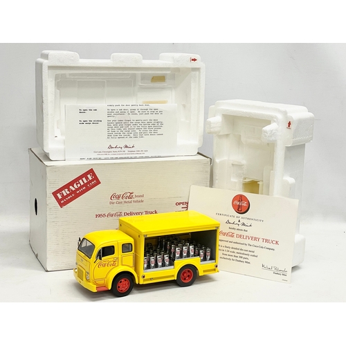 201 - A Danbury Mint 1955 Coca Cola Delivery Truck in box. Truck measures 24x11cm. Box measures