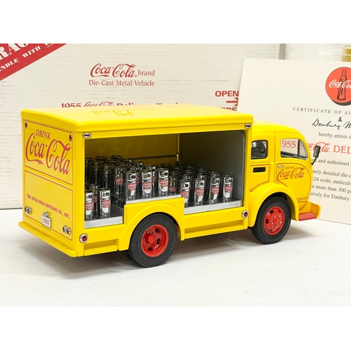 201 - A Danbury Mint 1955 Coca Cola Delivery Truck in box. Truck measures 24x11cm. Box measures