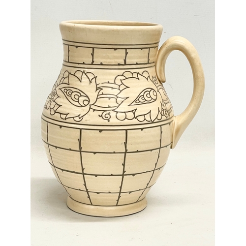 262 - A large 1930’s Charlotte Rhead pottery jug. Designed for Crown Ducal. 24x26cm.