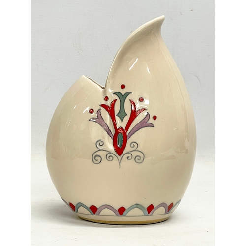 263 - A Charlotte Rhead jug. Designed for Crown Ducal. 15x21cm