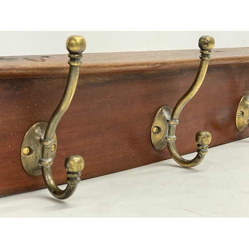 267 - A vintage hat and coat rack. 71cm