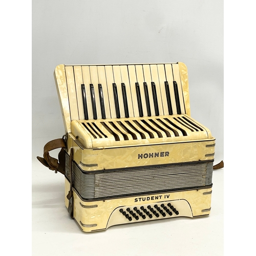 204 - A Hohner Student IV accordion in case.