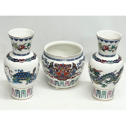 652 - A set of 3 Chinese ‘The Courage of the Terrestrial Tiger’ pottery. A pair of vases 27cm, a jardinier... 