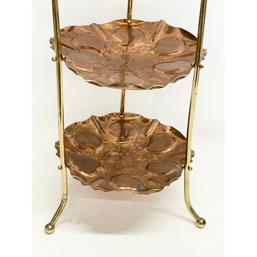 275 - A late 19th century Art Nouveau copper and brass 3 tier cake stand. 30x78cm