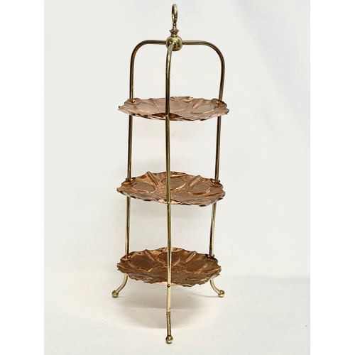 275 - A late 19th century Art Nouveau copper and brass 3 tier cake stand. 30x78cm