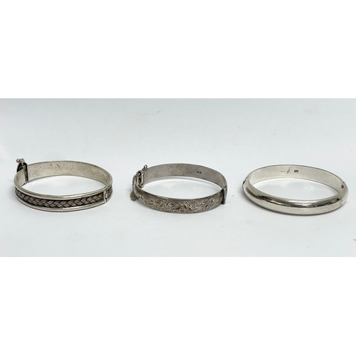 527 - 3 silver bangles