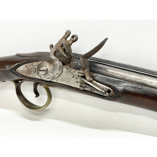 19 - An 18th century Blunderbust rifle with steel barrel and spring bayonet. Made in York for the Irish B... 