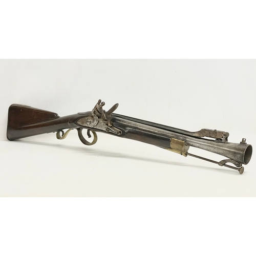 19 - An 18th century Blunderbust rifle with steel barrel and spring bayonet. Made in York for the Irish B... 