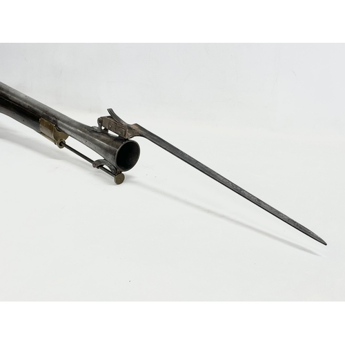 19 - An 18th century Blunderbust rifle with steel barrel and spring bayonet. Made in York for the Irish B... 