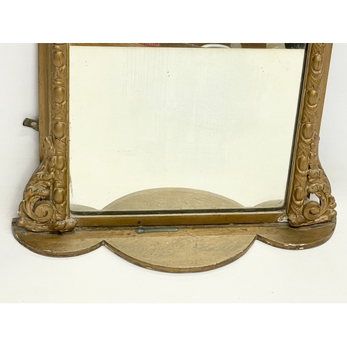 23 - A long Victorian ornate gilt framed mirror. 44x110cm