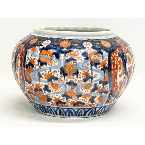 34 - A late 19th century Japanese Imari pattern jardiniere. Stamped. 25x17cm