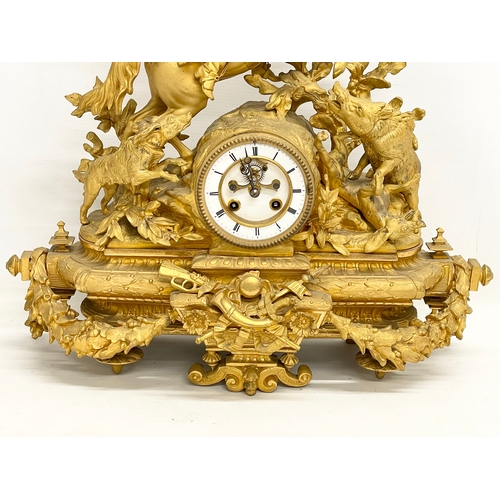 24 - A large Phillipe. H. Mourey (1840-1910) late 19th century gilt spelter mantle clock. With pendulum. ... 