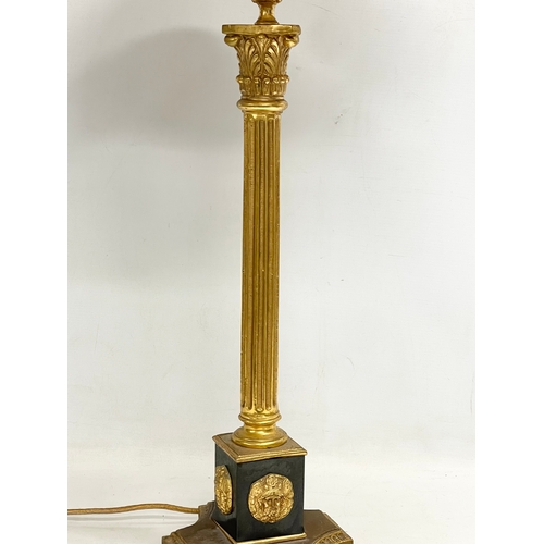 79 - A tall good quality gilt brass table lamp with Corinthian style pillar. Base measures 18x63cm.