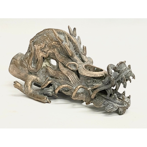 38 - A 19th century Chinese bronze incense burner. 21x10x11cm