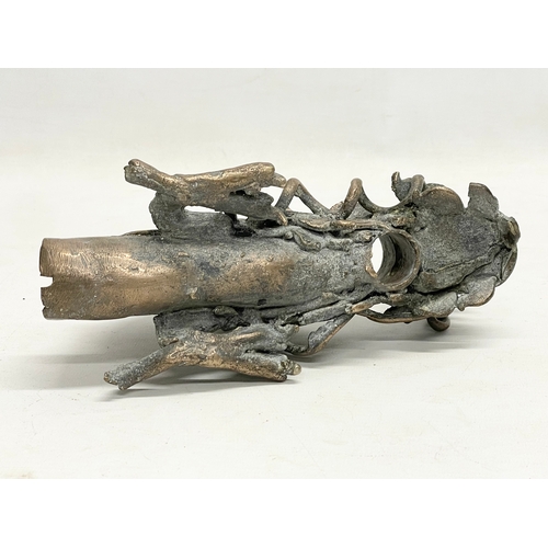 38 - A 19th century Chinese bronze incense burner. 21x10x11cm