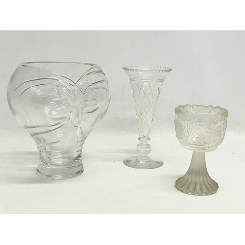 794 - A quantity of large heavy crystal bowls and vases.