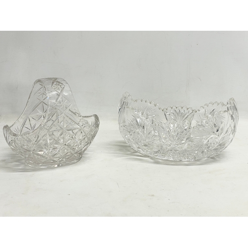 794 - A quantity of large heavy crystal bowls and vases.