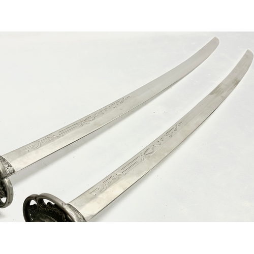 276 - A pair of good quality samurai style swords. 93cm