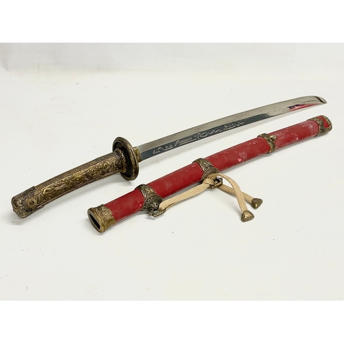 277 - A good quality samurai style sword. 72cm