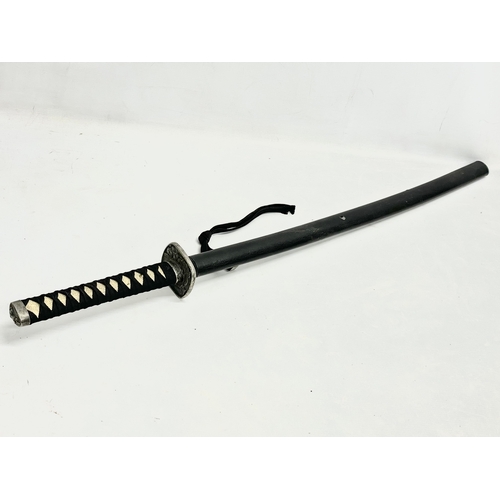 281 - A good quality samurai style sword. 93cm.