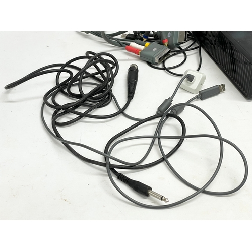 207 - An XBOX 360 console with a Kinect, 3 controllers and leads.