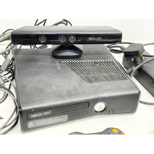 207 - An XBOX 360 console with a Kinect, 3 controllers and leads.