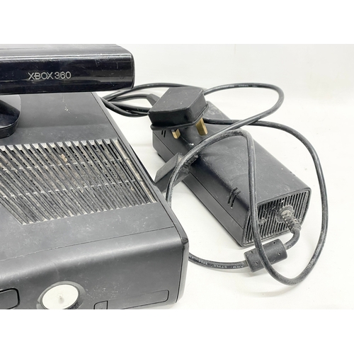 207 - An XBOX 360 console with a Kinect, 3 controllers and leads.