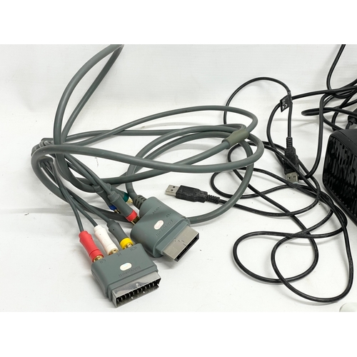 207 - An XBOX 360 console with a Kinect, 3 controllers and leads.