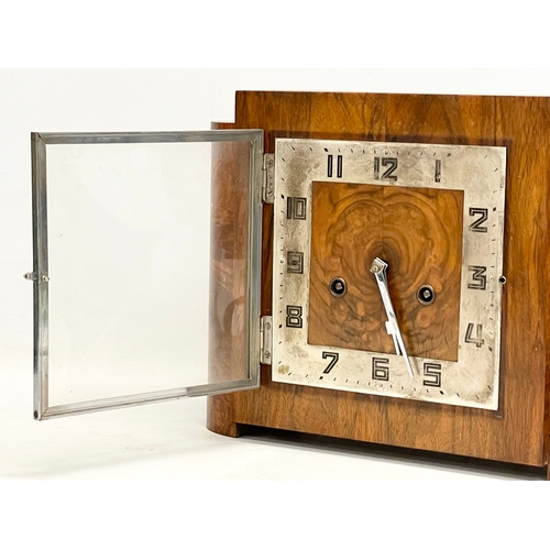 327 - A good quality vintage Art Deco Burr Walnut mantle clock. With key and pendulum. 32x12x23.5cm