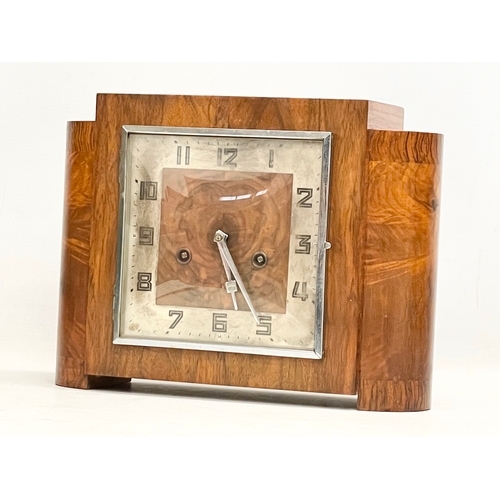 327 - A good quality vintage Art Deco Burr Walnut mantle clock. With key and pendulum. 32x12x23.5cm