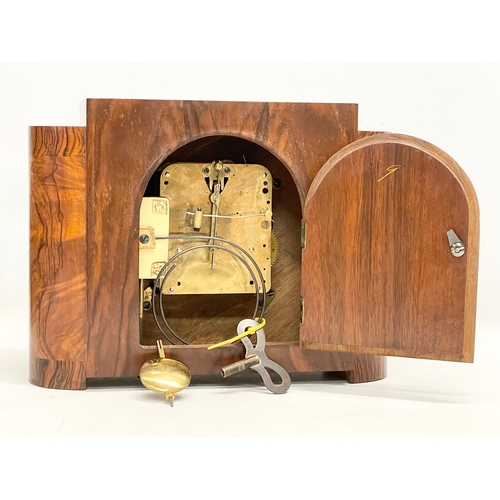 327 - A good quality vintage Art Deco Burr Walnut mantle clock. With key and pendulum. 32x12x23.5cm