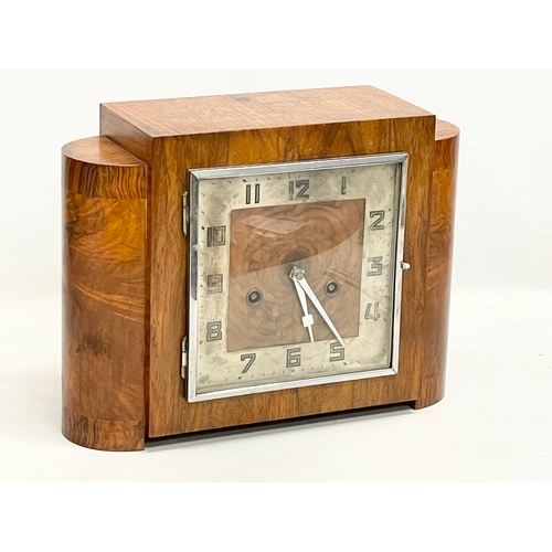 327 - A good quality vintage Art Deco Burr Walnut mantle clock. With key and pendulum. 32x12x23.5cm