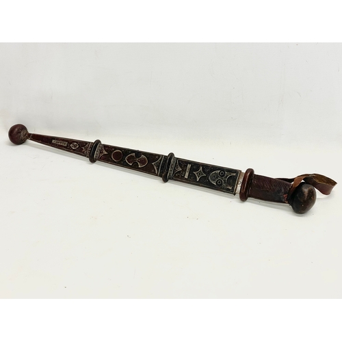 331 - A West African leather bound tribal sword. 66cm