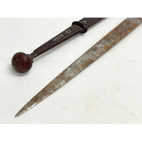 331 - A West African leather bound tribal sword. 66cm