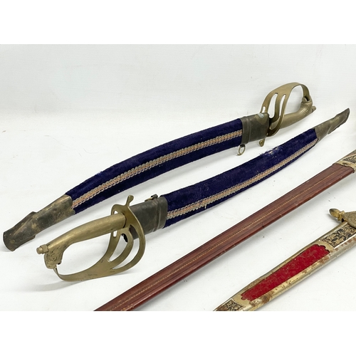 285 - 4 vintage ornamental swords. Largest 101cm.