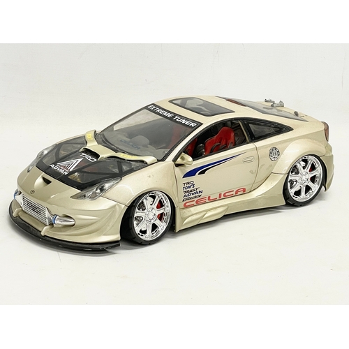 213 - A large 2004 Kentoys Toyota Celica TRD racing car. 37cm