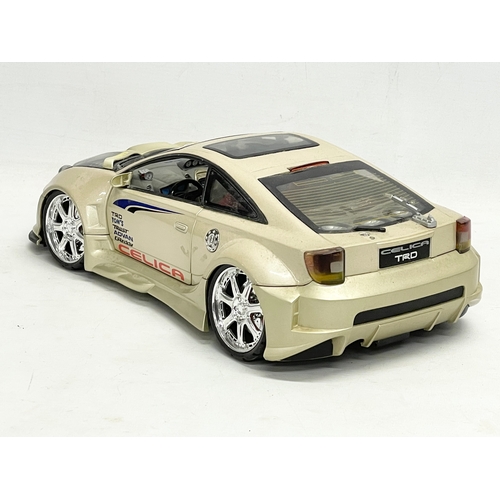 213 - A large 2004 Kentoys Toyota Celica TRD racing car. 37cm