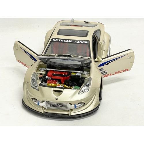 213 - A large 2004 Kentoys Toyota Celica TRD racing car. 37cm