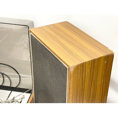 214 - A vintage ITT KB 2010 record player with speakers. 63x41x21cm. Speakers measure 29x18x46cm