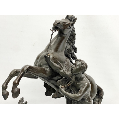 49 - A pair of large good quality late 19th century spelter Marly Horses. 42x22x52cm